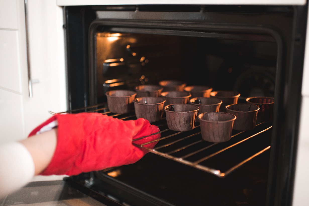 Chocolate cake batter put for baking in an oven set to 150 degrees.